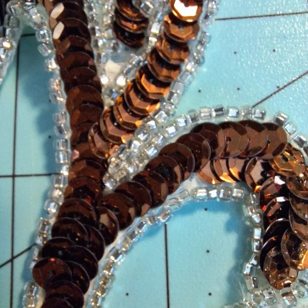 Bronze and silver sequin and bead applique mirror pair